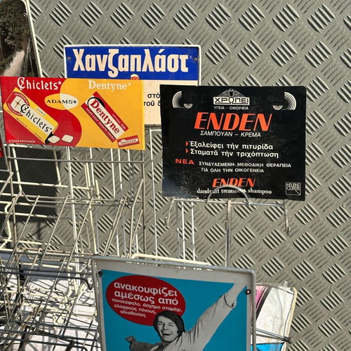 Retro kiosk stand used with authentic vintage advertisements