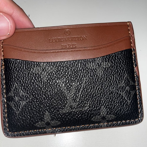 Louis Vuitton leather card holder used, black and brown