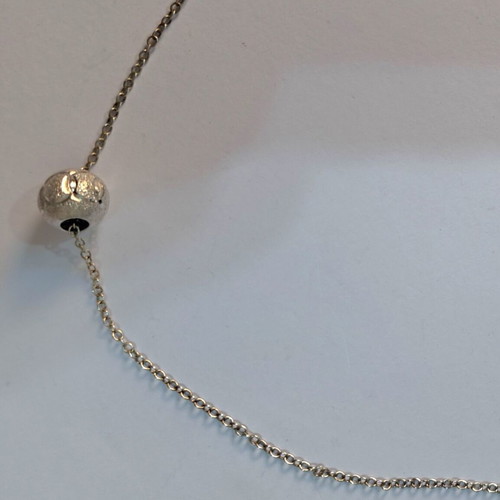 Silver pendant with sphere like new