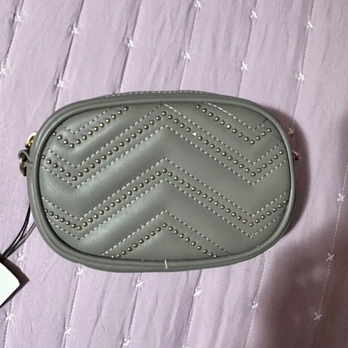Gray oval crossbody bag with gold details new