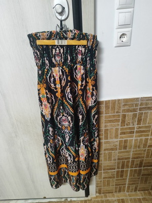 Long multicolor skirt with elastic waist and boho design