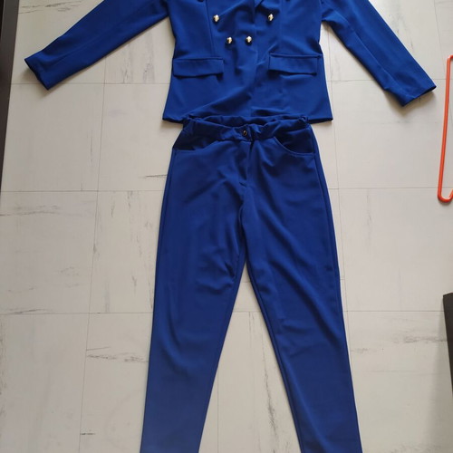Set jacket and trousers like new from thin fabric blue