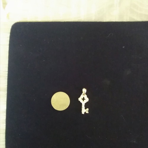 Key pendant gold plated, dimensions 3.4×1.4 cm