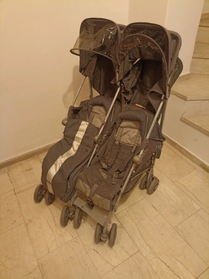 McLaren twin stroller used with all accessories