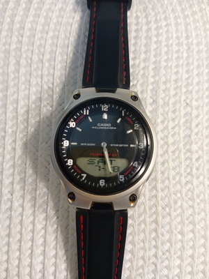 Casio Illuminator WR50M wristwatch like new with red stitched strap
