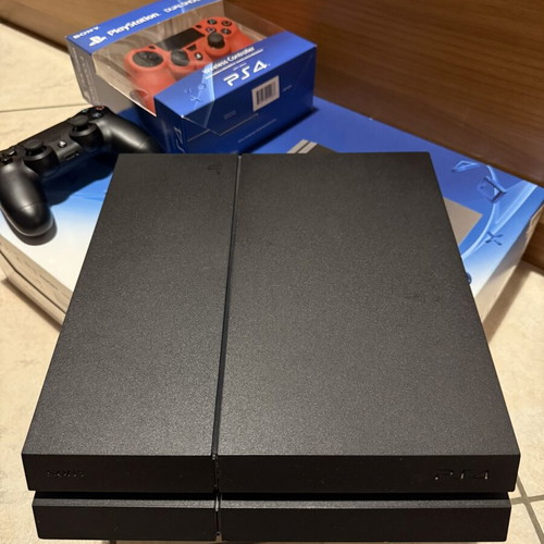 Sony PlayStation 4 500GB console like new with 2 controllers and 3 games