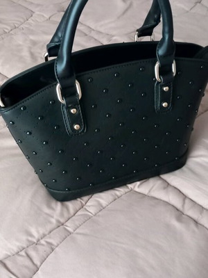 Women's bag used, black handheld with strap and gold details