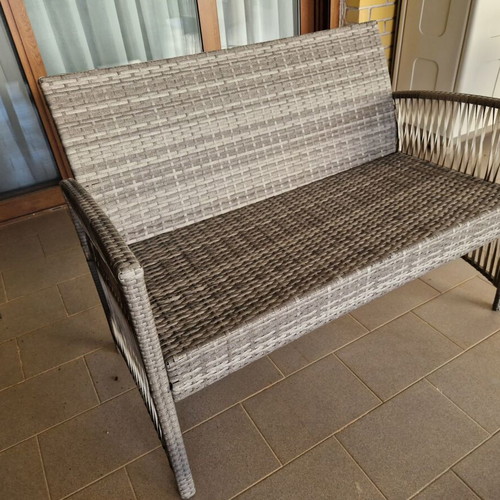 Garden sofa set with cushions and table