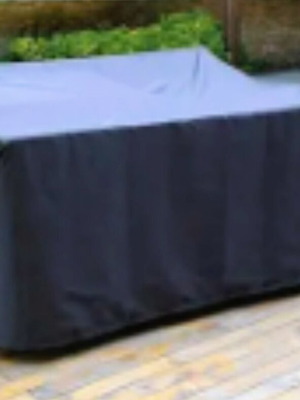 Blue waterproof cover for outdoor furniture with rings and rope