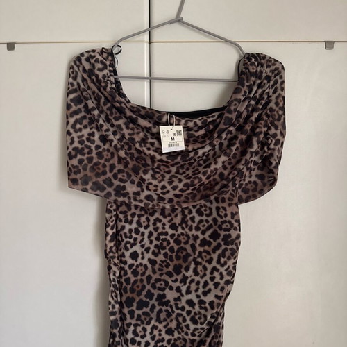 Women's animal print dress new, elastic, sizes S to L