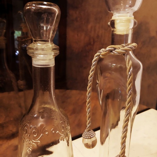 Set of transparent crystal bottles like new with decorative details