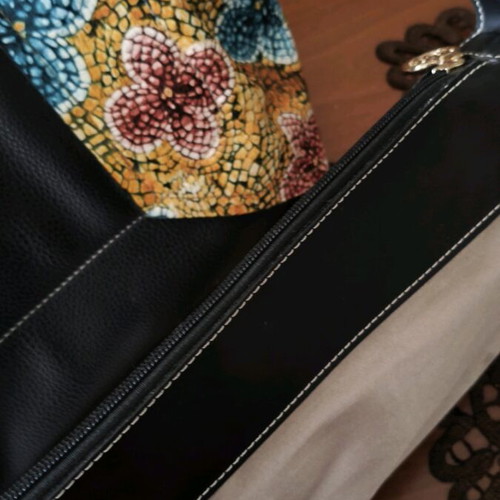 Elizabeth George shoulder bag with colorful butterfly print