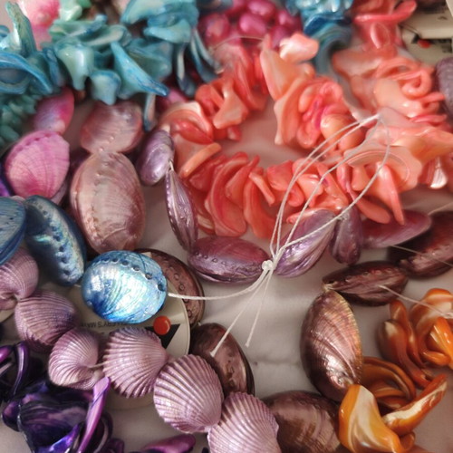 Jewelry making materials like new, shell chips, plastic and resin beads