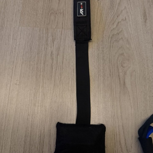 TRX strap used, blue color without ceiling hook