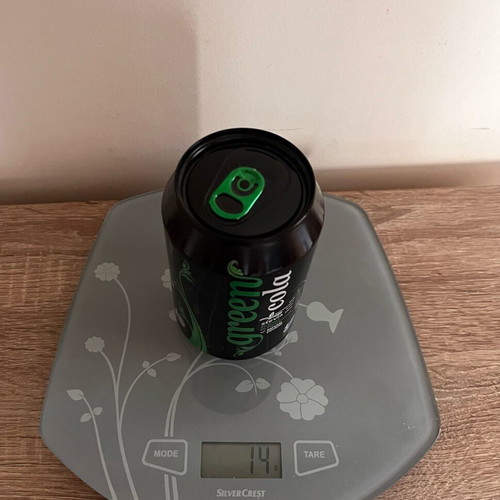 Collectible Green Cola can closed and empty, new