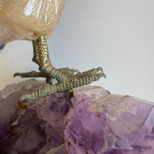 Decorative quartz parrot on raw amethyst base like new
