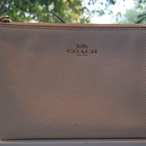 Coach wristlet bag used, beige with strap