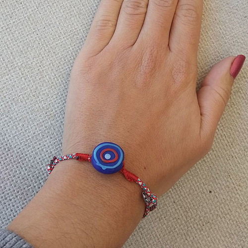 Martis bracelet handmade with cord and polymer clay eye made to order