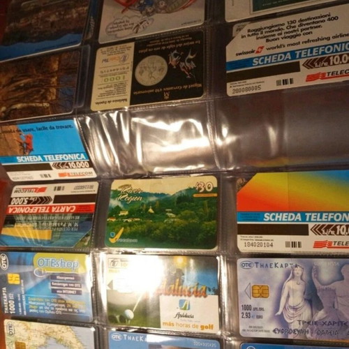 Phone card album like new, 75 cards from various countries and Greece