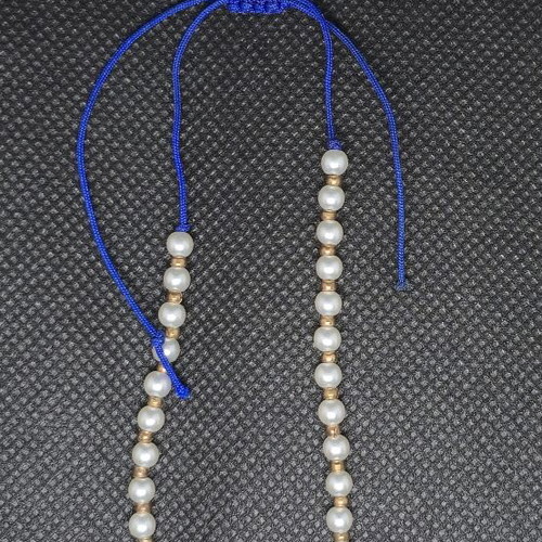 Handmade bracelet with pearls and blue cord like new