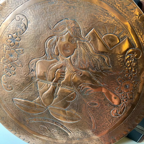 Decorative copper plate with embossed goddess of justice like new