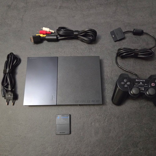Sony PlayStation 2 SCPH-90004 Slim console used with Dualshock and memory card