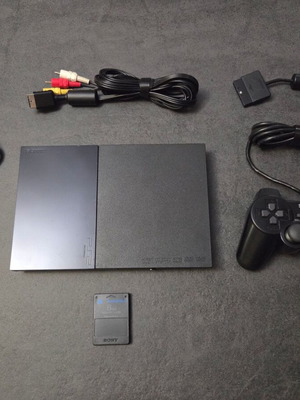 Sony PlayStation 2 SCPH-90004 Slim console used with Dualshock and memory card