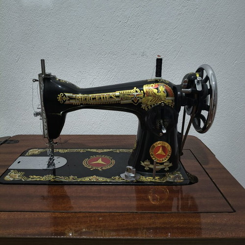 Mercedes vintage sewing machine with cabinet, treadle, like new
