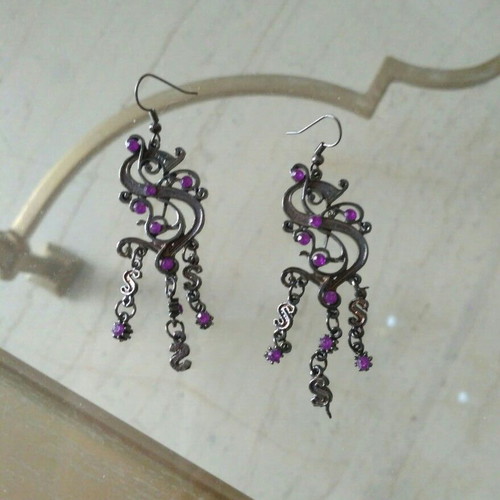 Fo earrings used in silver with purple stones