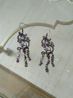 Fo earrings used in silver with purple stones