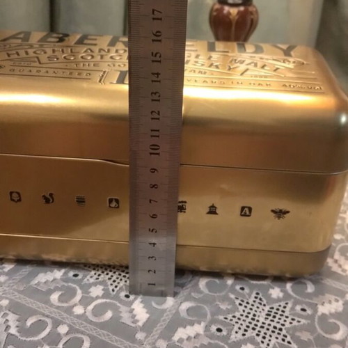 Metal Bottle Case like new with collectible bottle