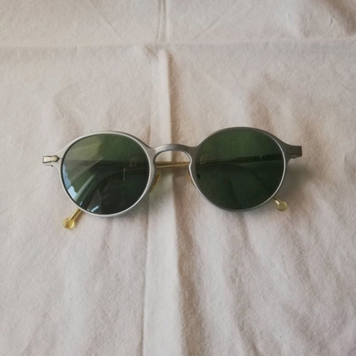 Sisley sunglasses used with silver metal frame and green lenses