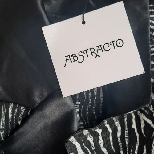 Abstracto suit new, black and white, bell-bottom pants