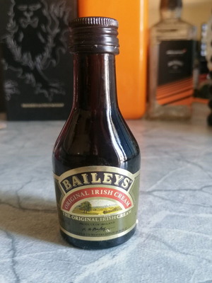 Baileys miniature bottle empty like new, glass collectible