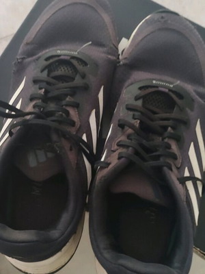Adidas athletic shoes used, size 45.5, worn with holes
