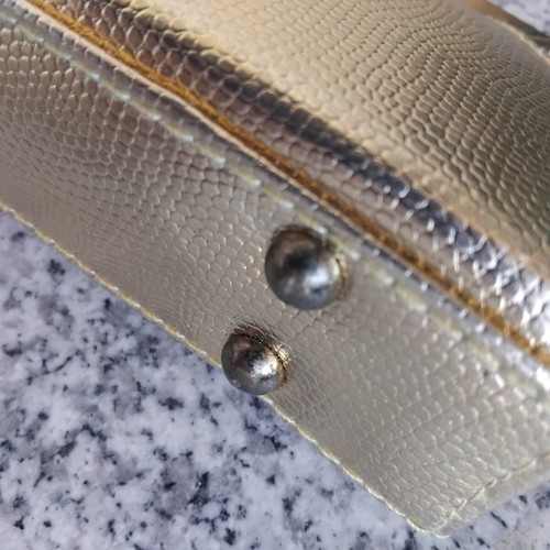 Gold evening clutch bag with rhinestones and metal frame