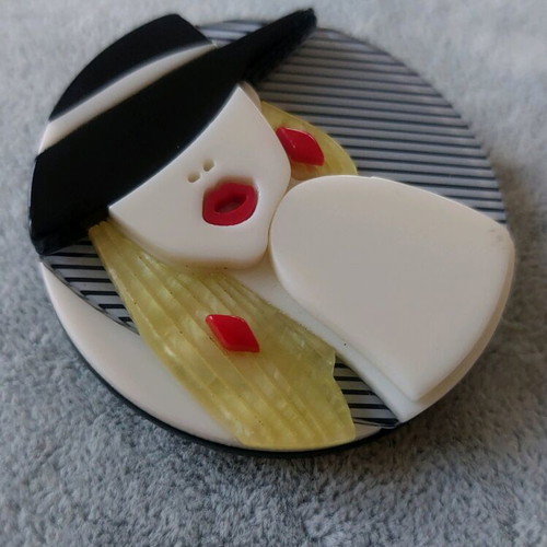 Large Plexiglass pin like new, multicolored with female face design