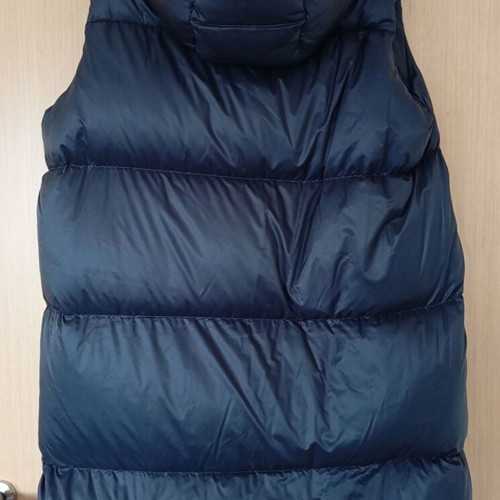 Tommy Hilfiger sleeveless down jacket like new, size L
