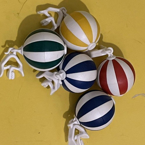 Hansi-Siebert tablecloth weights used, colorful
