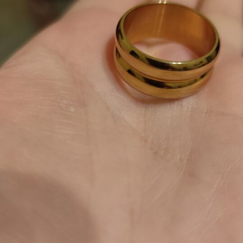 Gold-colored stainless steel ring new, size 8