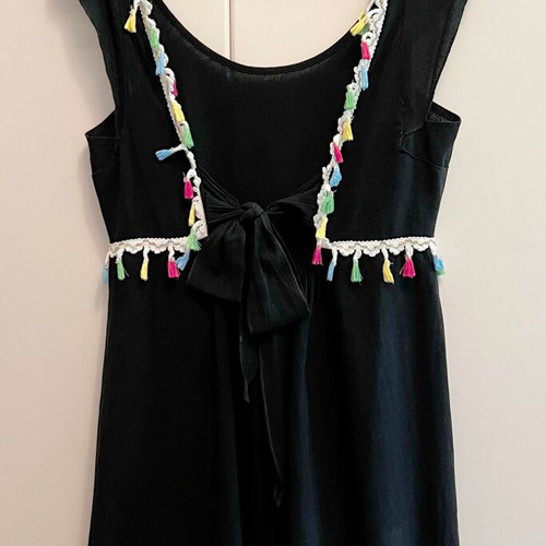 Dress with open back and bow used, black with colorful tassels