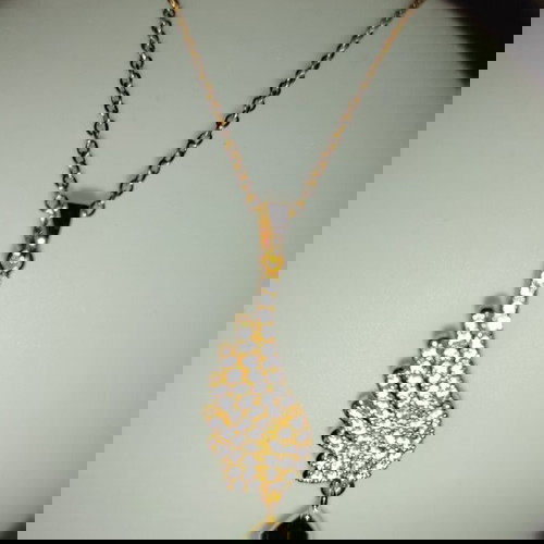 Κολιέ ατσάλινο χρυσό με δάκρυ σμαράγδι και φτερό αγγέλου καινούργιο