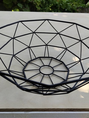 Modern metal fruit bowl, black geometric design