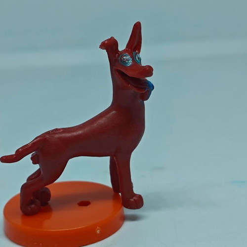 Vintage dog figure like new with orange base