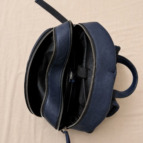 Caprisa blue backpack used with visible wear