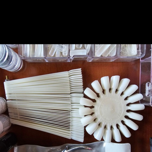 Nail art equipment used with tips, top coat, quickgel, and tools