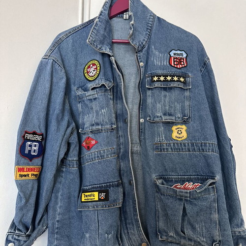 Women's oversized denim jacket with colorful patches