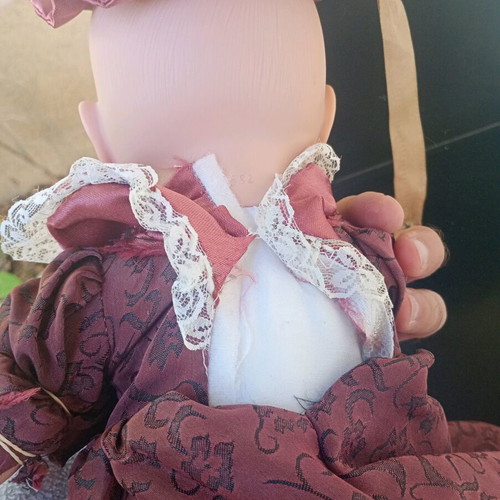 Doll with Victorian dress used, soft body, plastic head