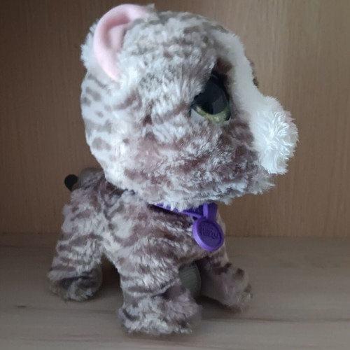 Plush feline doll used with sound