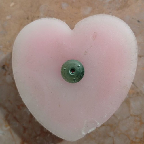 Handmade heart-shaped candle